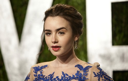 Lily Collins arrives at the Vanity Fair